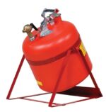 The Justrite Can Sft Tlt Pol W/Fct 5G R is a red fuel safety can with a locking lid, mounted on a metal cradle stand, featuring a convenient spout and handle for easy pouring and secure storage of flammable liquids.