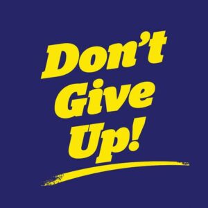 The Justrite Mat, 195 DonT Give Up 4X6 Bu, features Dont Give Up! in bold yellow text on dark blue, with a yellow underline for inspiration.