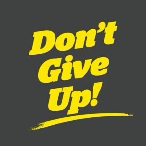 Bold yellow text on a dark gray background reads Dont Give Up! with an underline, echoing the inspiring message found on a Justrite Mat, 195 DonT Give Up 4X6 Ch.
