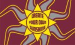 The Justrite Mat, 195 Create Sunshine 3X5 Rd features an illustration of a vibrant sun with gray and yellow rays on a maroon backdrop, centered with the uplifting phrase CREATE YOUR OWN SUNSHINE.