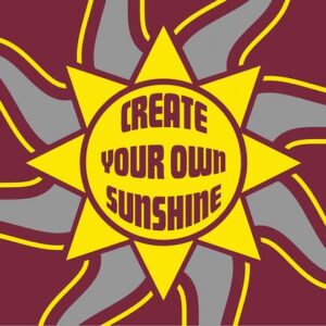 The Justrite Mat, 195 Create Sunshine 3X5 Rd features an illustration of a vibrant sun with gray and yellow rays on a maroon backdrop, centered with the uplifting phrase CREATE YOUR OWN SUNSHINE.