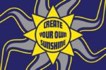 The Justrite Mat, featuring a stylized sun with gray and blue wavy rays on a dark blue background, showcases a yellow center with CREATE YOUR OWN SUNSHINE in bold blue letters, embodying the essence of the 195 Create Sunshine 4X6 Bu collection.