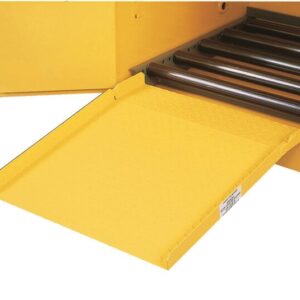 A close-up of a yellow industrial machine shows a Justrite Drum Ramp, F/All Drum Cabinets extending outward. The ramps textured surface complements the machine’s interior lined with metal rollers for efficient operation.