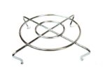 This metal trivet, similar to the Justrite Grill Guard, F/Cf Head 26265L, boasts a circular design with four sturdy legs and intersecting lines connecting its inner and outer circles for dependable support of hot cookware.