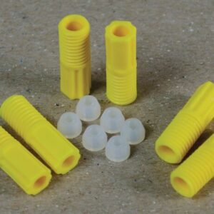 Yellow plastic anchors and white conical inserts, similar to the Justrite 2.0 Mm Tubing Connector Set, are organized on a textured surface.
