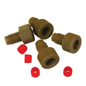 On a white surface, three brown plastic threaded caps with ribbed edges and hollow centers are neatly arranged, accompanied by four small red rubber O-rings and a Justrite Fitting F/Tube 1/8Od, Set/4.