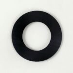 A black, flat circular Justrite Gasket (Viton, 2 ID, 5111, Aerslv) sits against a plain white background, resembling a large washer with its smooth matte finish.