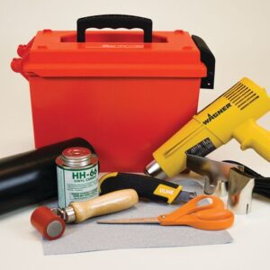 Discover our Justrite Repair Kit, Modified PVC Fabric, offering a variety of crafting tools and materials including a red plastic toolbox, yellow heat gun, black vinyl roll, adhesive can and brush, red roller, utility knife, silver cutter, orange scissors, and gray modified PVC fabric sheet.
