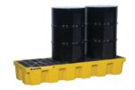 Two black industrial barrels sit on a yellow Justrite Pallet, 3 Drum, Ecopoly model with a grid-like surface, designed for eco-friendly spill containment and efficient leak management.