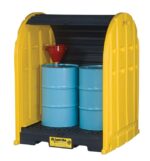 The yellow plastic Justrite Drumshed W/Pllt, 2 Drm, Ecoply features an open front design for two blue barrels (one with a red funnel) on a sturdy black base, showcasing the durable Justrite brand.