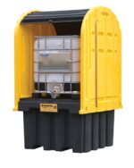 The Justrite Ibc Outdoor Shed W/Plt, Ecoply, in yellow and black, features an open front displaying a metal container and has a hinged roof design for industrial storage and safety with durable construction.