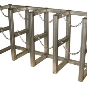 The Justrite Gcyl Barricade Rack,4X1,Ss features four rectangular frames with horizontal bars and chains for crowd control or security. Its metallic finish offers durability and distinctive style in managing public spaces.