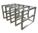 The Justrite Gcyl Barricade Rack,4X3,Ss features a stainless steel frame made of rectangular prisms linked by chains, with a sleek design showcasing three parallel horizontal sections.
