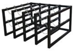 The Justrite Gcyl Barricade Rack,4X4, is a sleek black metal log storage unit with three sections. Its rectangular design includes top chains to securely organize and hold firewood in compact spaces.