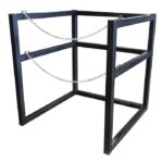 The Justrite Gcyl Barricade Rack, 33In, is a black metal stand with a rectangular frame featuring horizontal and vertical bars and two diagonal chains for support, designed to securely hold or display an object.