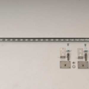 The Justrite Seismic Brkt F/Cabnet, Flr/Wal hardware set, shown on a white background, features a long perforated metal strip with neatly arranged brackets, bolts, nuts, and screws. Ideal for floor and wall applications to ensure stability.