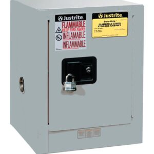 The Justrite Cabinet, Flam Ctop 4G in gray, includes multiple warning labels, a black handle, and a secure silver padlock to ensure safe storage of flammable liquids.