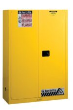 The Justrite Cabinet, Flam Sfty 45G Man Yel, is yellow with a sturdy black handle and bold Flammable and Keep Fire Away warnings. Its closed door is enhanced by prominent black and yellow hazard symbols at the bottom.