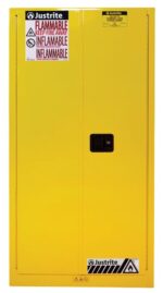 The Justrite Cabinet, Flam Sfty 60G Sc Yel, is a yellow safety cabinet labeled Flammable and Keep Fire Away, featuring a black handle and safety symbols at the bottom for secure hazardous material storage.