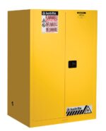 The Justrite Cabinet, Flam Sfty 90G Sc Yel, is bright yellow with Flammable labels in English and Spanish. It has a central black handle and signature branding, providing secure storage for hazardous materials.
