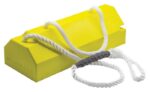 The Justrite Chock,Ac,20,Rpad,Ea,Qlr,Han,Y is a yellow rectangular brick with a hexagonal cross-section. It features two twisted white ropes on top, with one looped through an Rpad gray connector for use as a handle.
