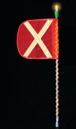 A Justrite Whip,Ap,Led,A,5,Of,Yx,A features a red flag with a yellow reflective X on a pole wrapped with spiral lights and topped with a bright bulb against black.