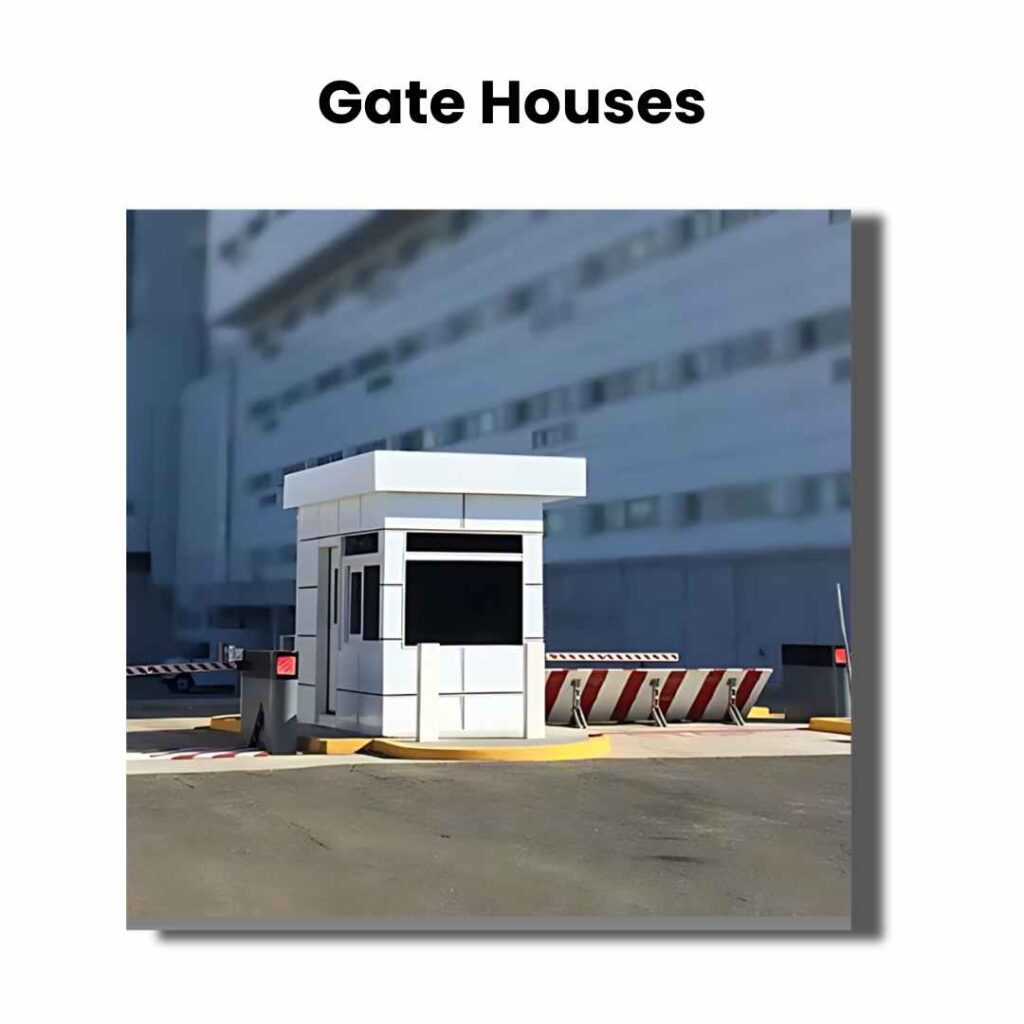 A small, white security gatehouse stands in front of a building, essential for property management. It features a window and is surrounded by traffic barriers. The text Gate Houses is prominently displayed at the top of the image, underscoring its importance in safety supplies.
