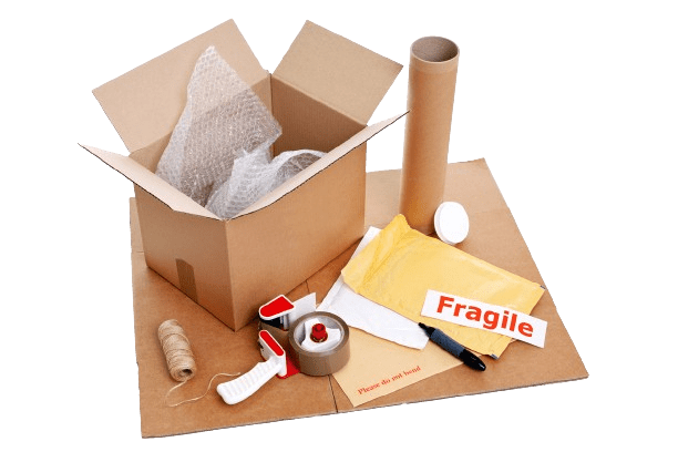 An open cardboard box with bubble wrap inside is surrounded by essential shipping supplies: a cardboard tube, a bubble mailer labeled Fragile, twine, packing tape, a tape dispenser, and protective paper—offering secure packaging solutions for safe delivery.