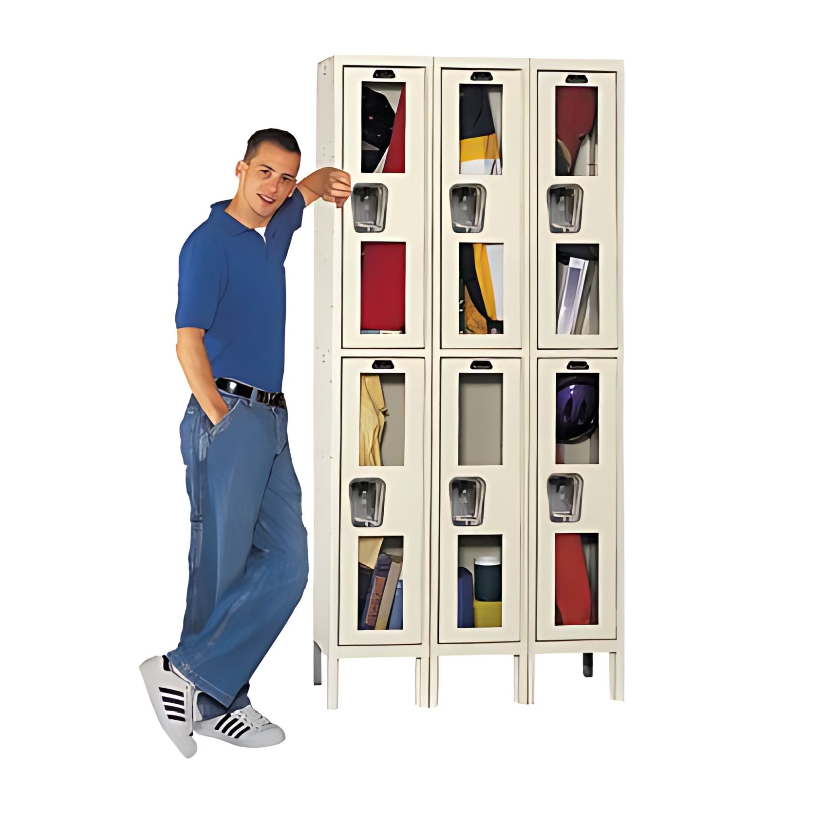 A person in a blue shirt and jeans leans casually against a row of beige lockers, each compartment brimming with binders, folders, and helmets. Smiling at the camera, they exude a relaxed confidence amidst the organized chaos.
