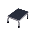 A small, rectangular metal step stool with a black textured surface and four silver legs, each ending in a black cap. The simple, utilitarian design makes it ideal for reaching higher places in healthcare settings.