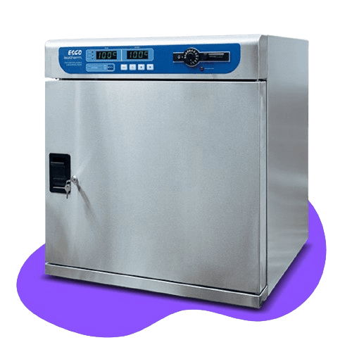 Stainless steel scientific incubator with blue digital control panel and temperature display, placed on a purple surface.