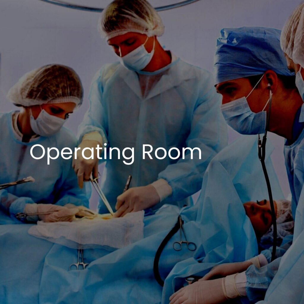 In a well-lit operating room, surgeons donning blue scrubs and gowns expertly use Blickman medical instruments. A surgical lamp casts focused light on their precision work. The words Operating Room appear over the image, capturing this critical moment in healthcare.