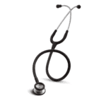 A black stethoscope with silver accents is coiled on a white background, embodying the essence of healthcare. The tubing gracefully curves, leading to the chest piece at one end and earpieces at the other.