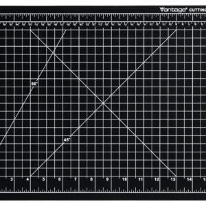 The Dahle Vantage® Premium Self-Healing Cutting Mat, 12 x 18, Black (Case of 24), offers precision with a white grid, inch and millimeter measurements, and angled lines at 45° and 60°, catering to both hobbyists and professionals.