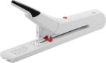 The Novus B56 XL Heavy Duty Long Arm Stapler is a long-reach stapler in white with a black handle and red reset button. It features a base metal ruler for precise, reliable stapling at various depths when positioned on a flat surface.
