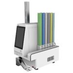 The MH-USA UV Tissue Cassette Printer, featuring a 10 touch screen and built-in scanner, is compact and modern with vertical racks for colored tubes. Its sleek white body with metallic accents ensures seamless laboratory operations.
