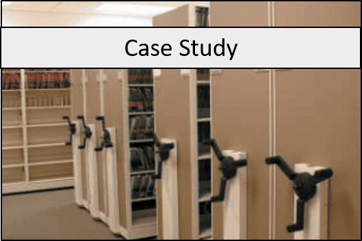 Mobile high-density storage units with large black handles are lined up in a brightly lit room, maximizing space efficiently. The words Case Study are displayed above the image.