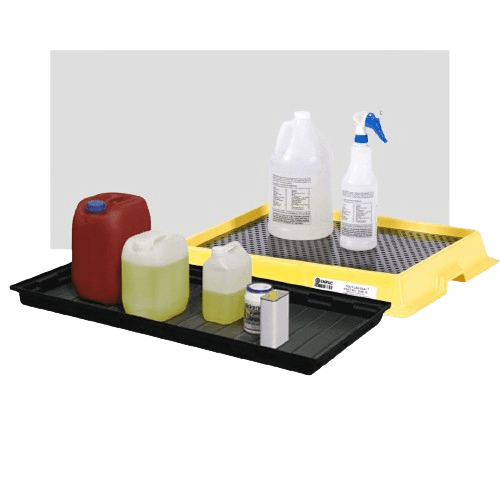 Two chemical spill trays: one yellow with white bottles, including a spray bottle; the other black with red, yellow, and clear containers. Both trays are used for spill containment or storage of potentially hazardous liquids.