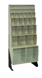 The Quantum Tip Out Bin Floor Stand is a single-sided unit measuring 10D x 23-5/8W x 52H. It includes models QTB302, QTB303, QTB304, QTB305, QTB306, and two ivory QTB309 bins. Made with 14-gauge steel and finished in black, it elegantly displays transparent compartments for small item organization against a plain white background.