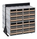 The Quantum Interlocking Storage Cabinets Floor Stand has a double-sided design with 48 ivory drawers and measures 24D x 23-5/8W x 28H. Featuring a black coated finish on its durable 14 gauge steel frame, it supports up to 750 lbs.