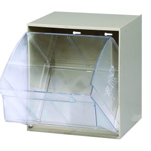 The Quantum Tip Out Bin, made in the USA, features a polystyrene ivory cabinet with a front-opening plastic clear container that tilts to a 45° angle. It offers space for storage and includes two mounting holes for easy wall installation. The bin has one compartment with a handle and label slot.