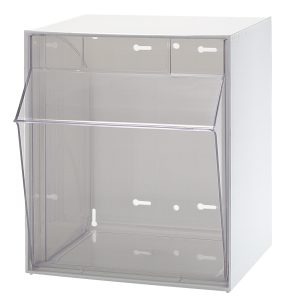The Quantum Tip Out Bin features a clear, plastic container with a flip-open front lid at a 45° angle and includes a handle with label slot. Its rectangular design allows easy organization while providing visibility of the contents inside. Made in the USA, it comes in polystyrene white cabinet.