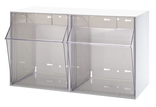 The Quantum Tip Out Bin is a dual-compartment plastic clear container with a polystyrene white cabinet. It features a 45° angle opening, handle with label slot, and circular and rectangular holes for easy wall mounting. Made in the USA.