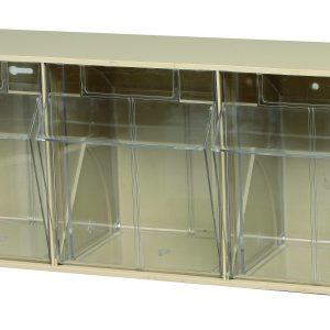 The Quantum Tip Out Bin features three compartments, each with a handle and label slot, clear plastic containers that open to a 45° angle within an ivory polystyrene cabinet. This product is ideal for organizing items at home or in the office and is proudly made in the USA.