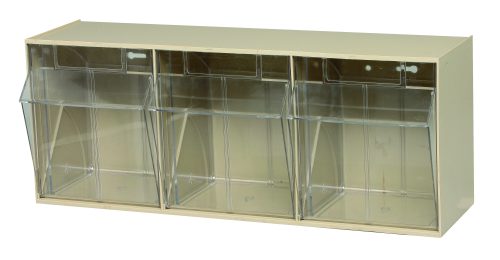 The Quantum Tip Out Bin features three compartments, each with a handle and label slot, clear plastic containers that open to a 45° angle within an ivory polystyrene cabinet. This product is ideal for organizing items at home or in the office and is proudly made in the USA.