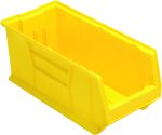 The Quantum Hulk 24 stackable container, made in the USA from durable polypropylene, is bright yellow with an open front. It measures 23-7/8L x 11W x 10H and features straight sides and a lip around the top edge. The interior is shown empty against a plain white background.