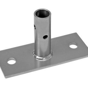 The Quantum Single Seismic Foot Plate is a rectangular metal bracket with a center-welded cylindrical tube. It includes two mounting holes on opposite sides and smaller holes in the tube for fastening or connecting.