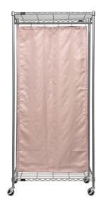 The Quantum Mobile Privacy Partition transforms with a light pink fabric cover, resembling a curtain and attaching with top hooks. Measuring 36W x 12D x 78H, it features a bottom grid shelf and boasts a gray epoxy antimicrobial finish.
