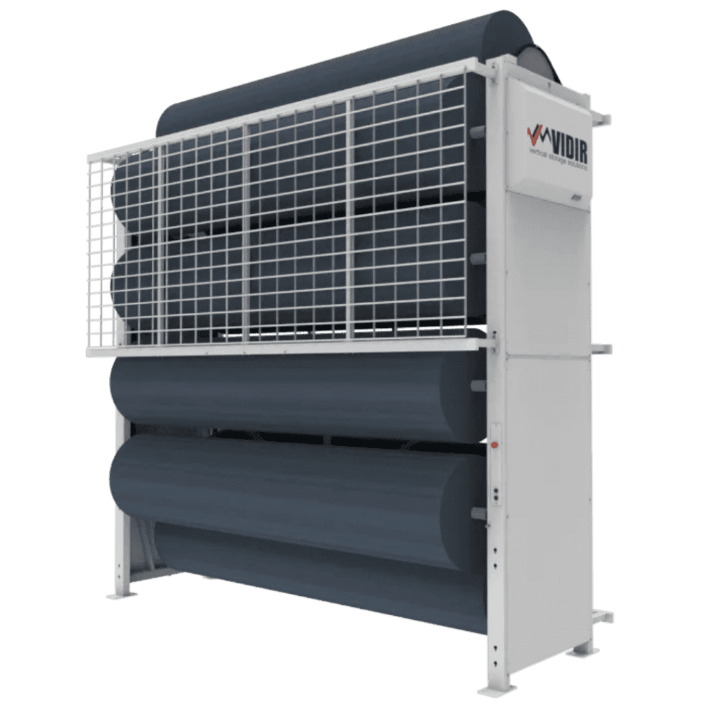 A large, vertical Vidir Vertical Storage Solutions system with multiple horizontal rolls of material, enclosed by a white metal frame with a grid safety cover and labeled Vidir on the top right section, designed for efficient space optimization.
