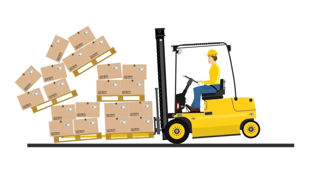 A person wearing a hard hat operates a yellow forklift, causing several boxes to fall from a stack of pallets—highlighting the risks of poor warehouse workflow optimization.